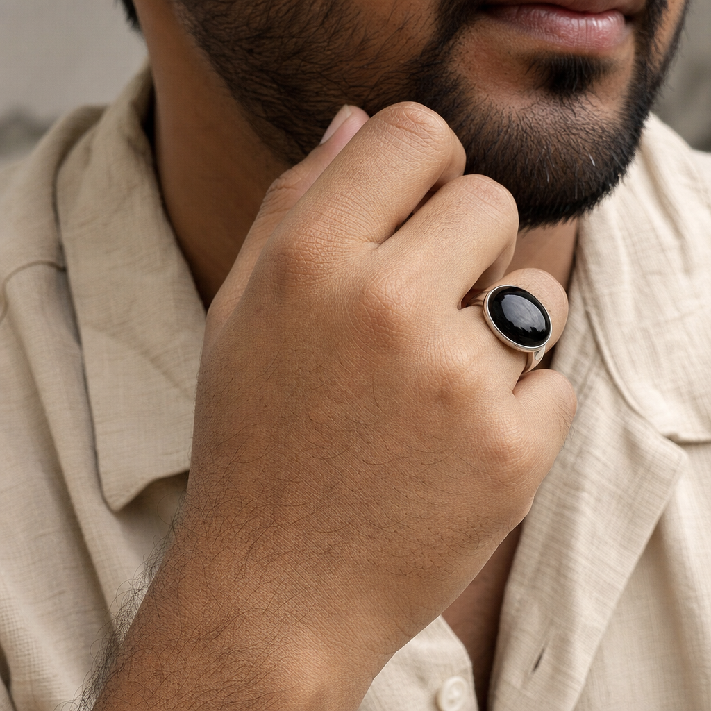 Agate man wearing gemstone ring