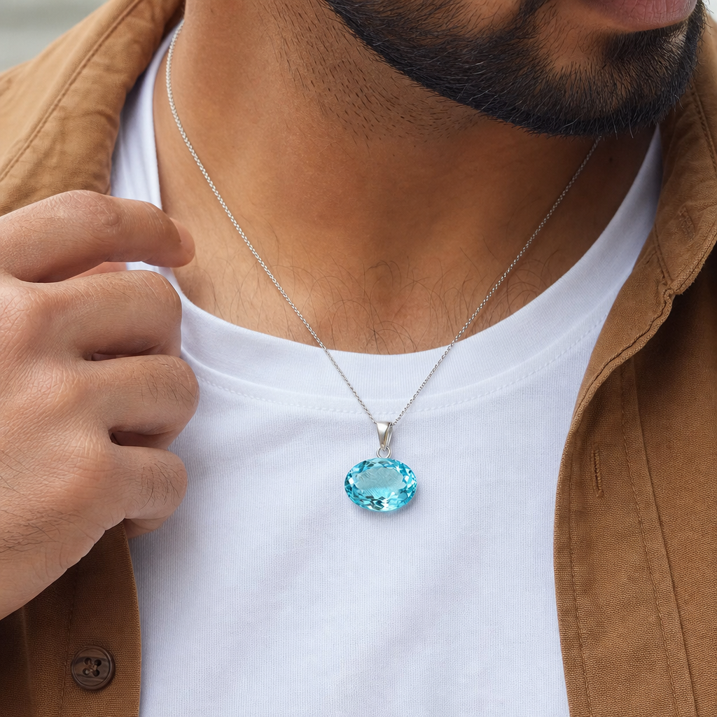 Blue Topaz man wearing gemstone pendant