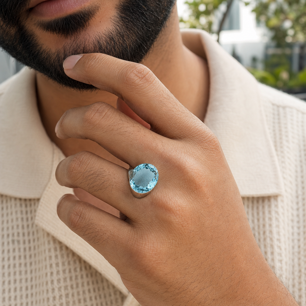 Blue Topaz man wearing gemstone ring