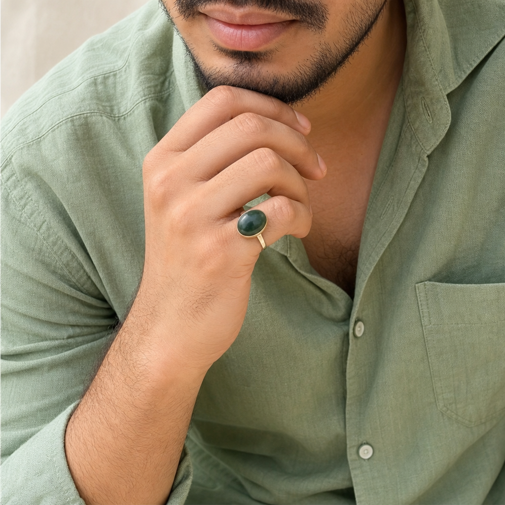 Cat's Eye man wearing gemstone ring