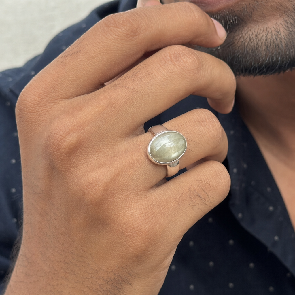 Ceylon Cat's Eye man wearing gemstone ring