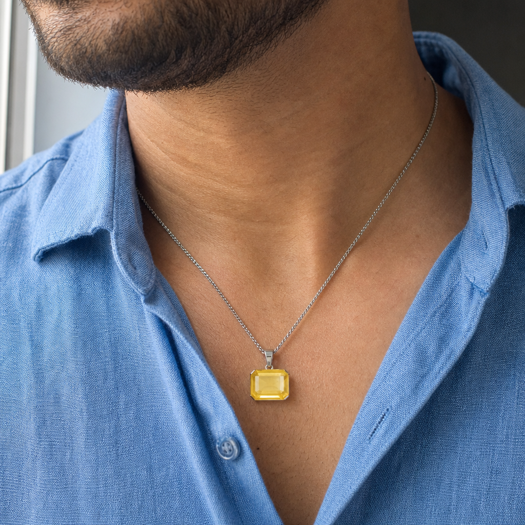 Ceylon Pukhraj man wearing gemstone pendant