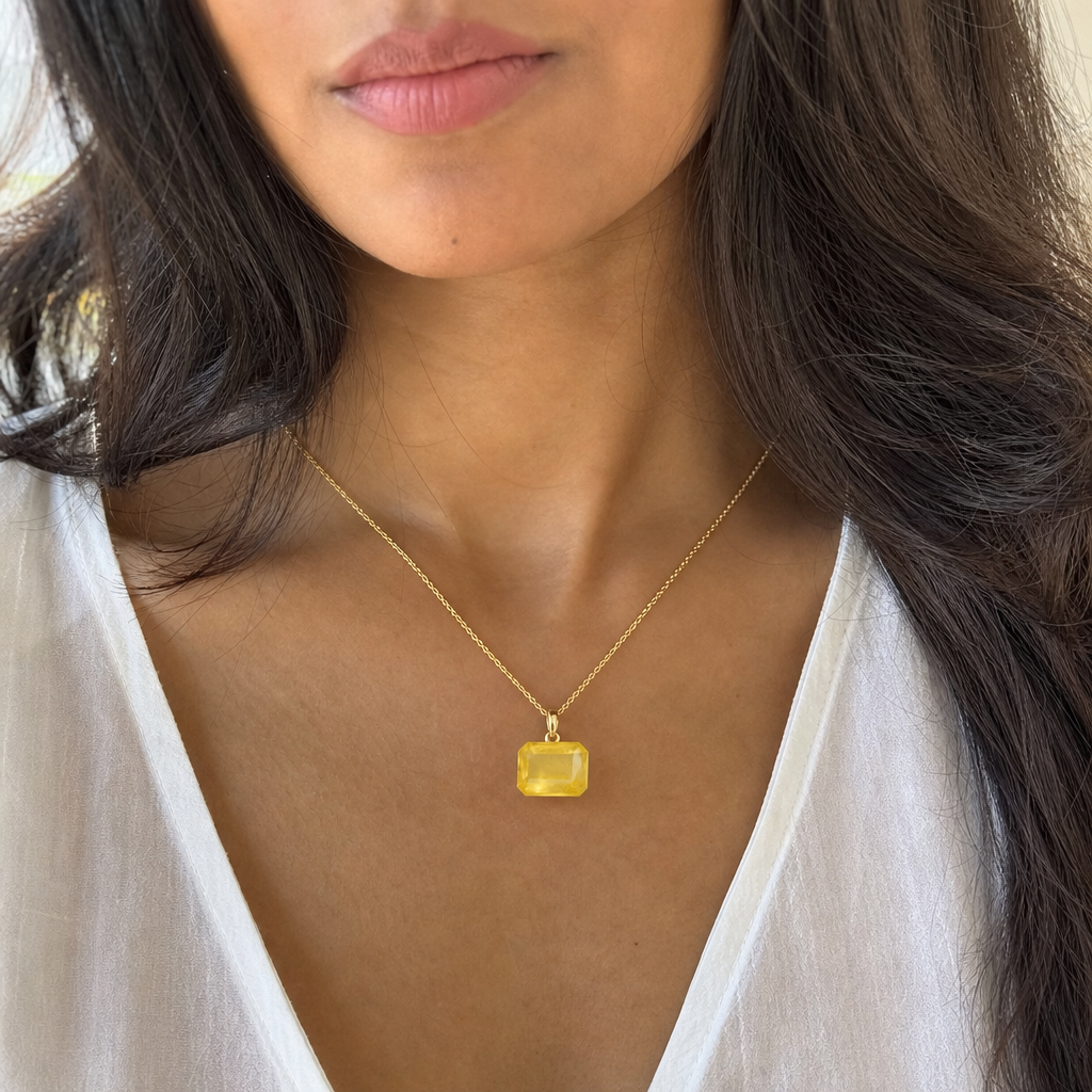 Ceylon Pukhraj woman wearing gemstone pendant
