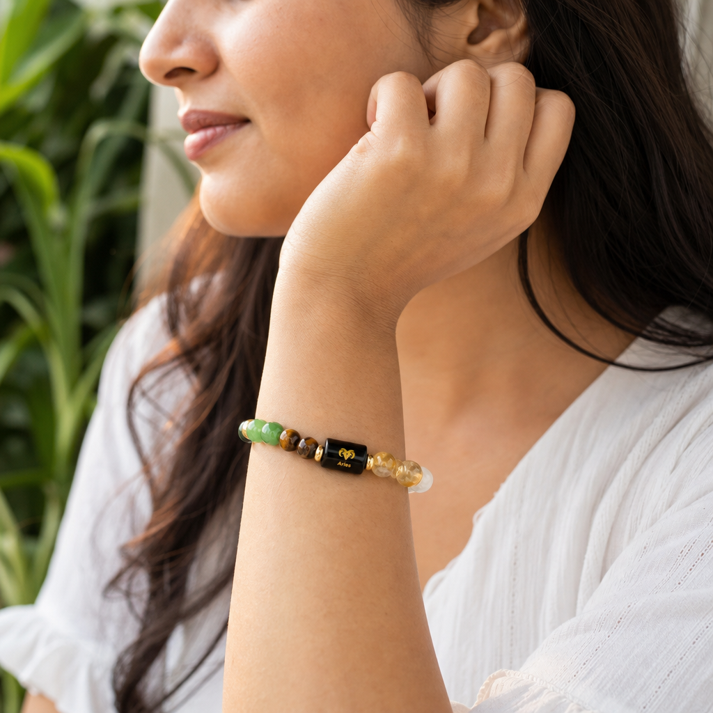 Woman wearing Dhan Yog Bracelet with Zodiac Charm