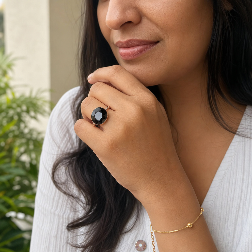 Garnet woman wearing gemstone ring