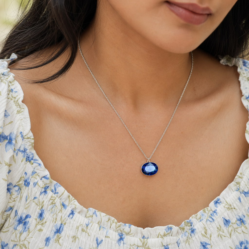 Iolite woman wearing gemstone pendant