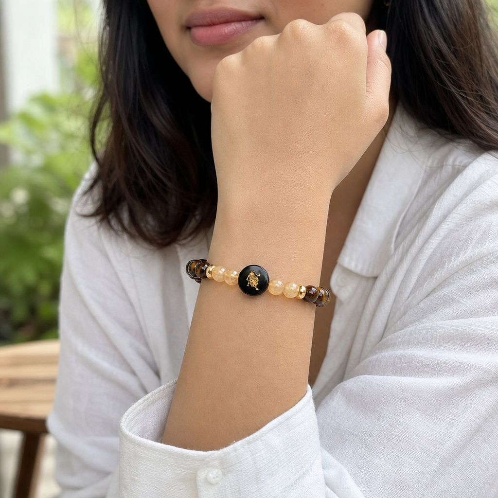 Woman wearing Leo (सिंह राशि) Zodiac Tiger Eye & Citrine Bracelet for Women