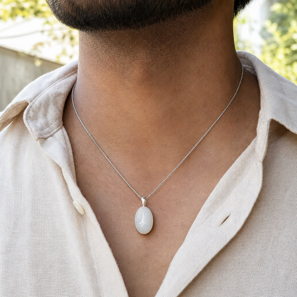 Moonstone man wearing gemstone pendant