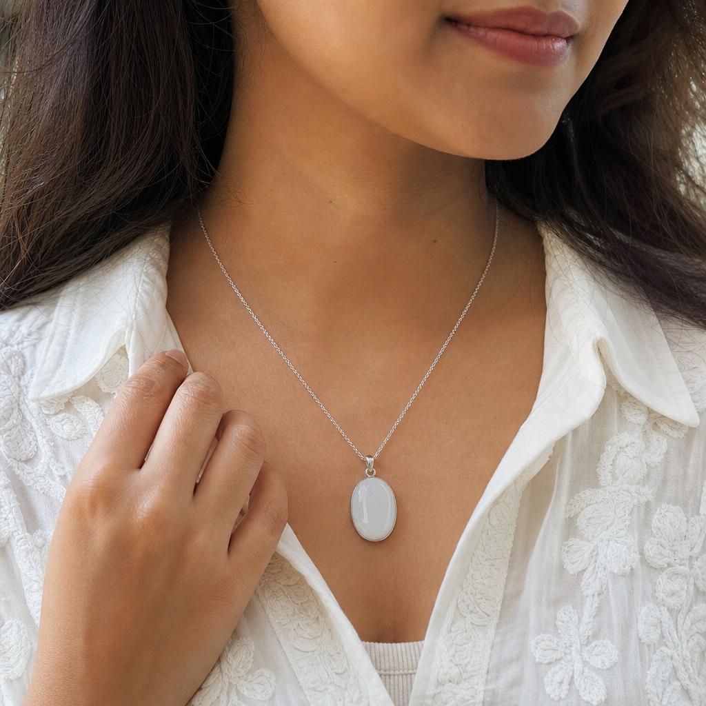 Moonstone woman wearing gemstone pendant