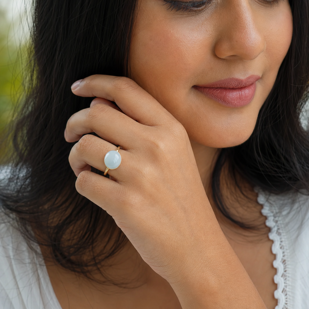 Moonstone woman wearing gemstone ring