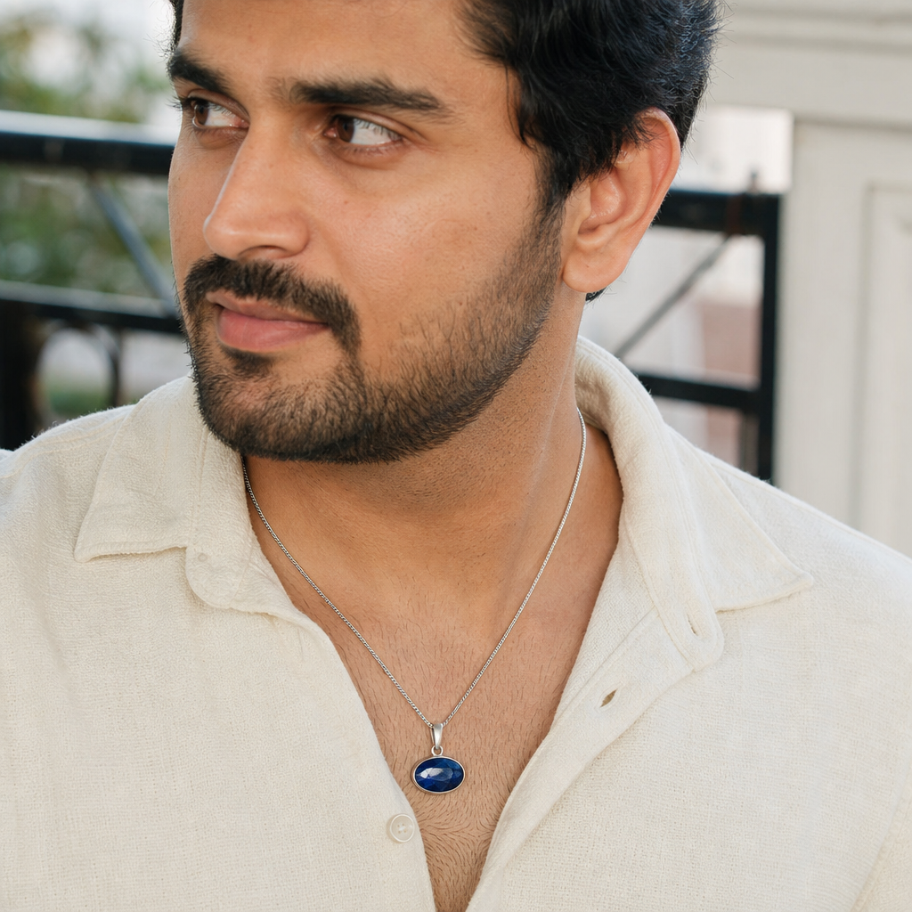 Neelam man wearing gemstone pendant