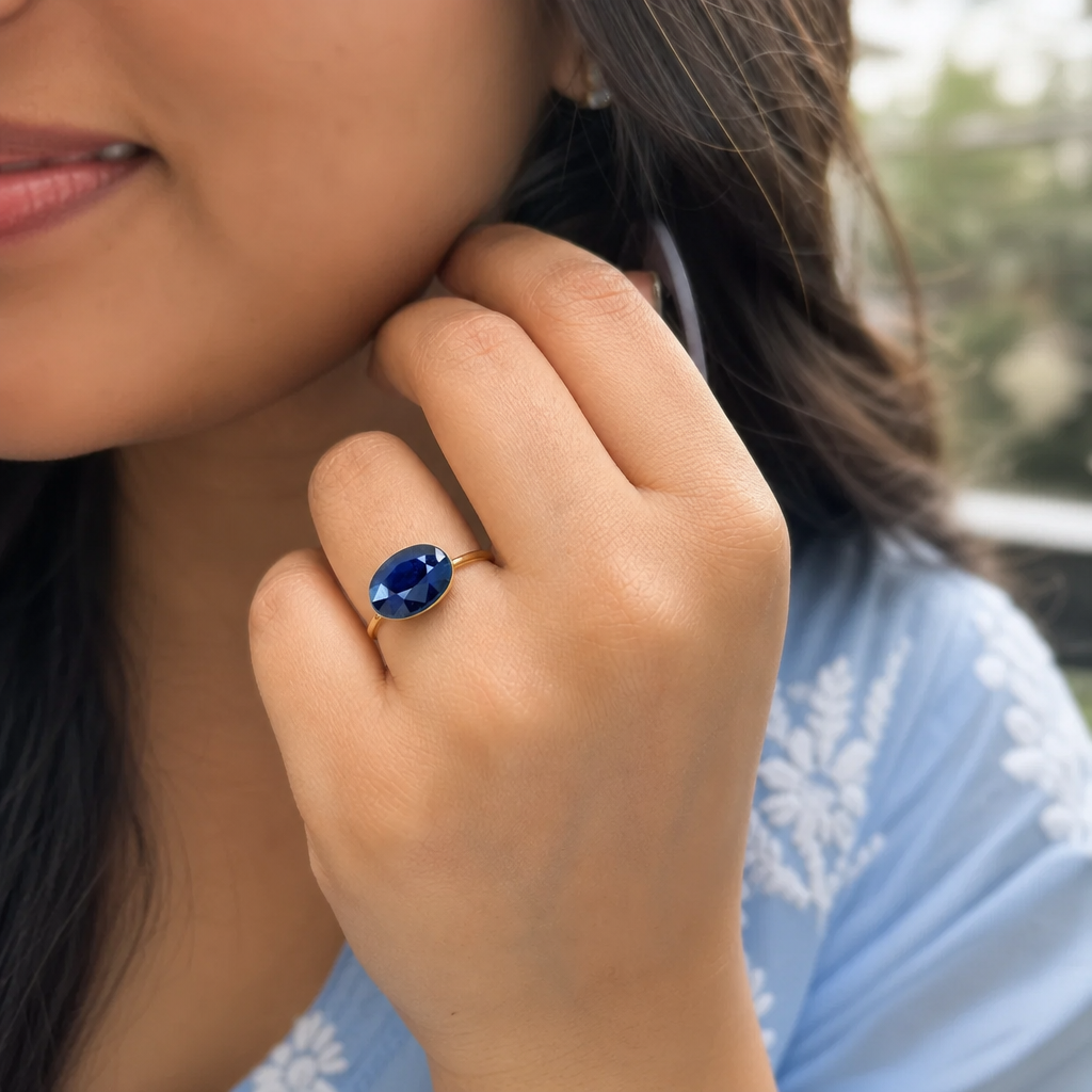 Neelam woman wearing gemstone ring