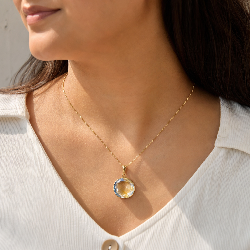 Peetambari Neelam woman wearing gemstone pendant