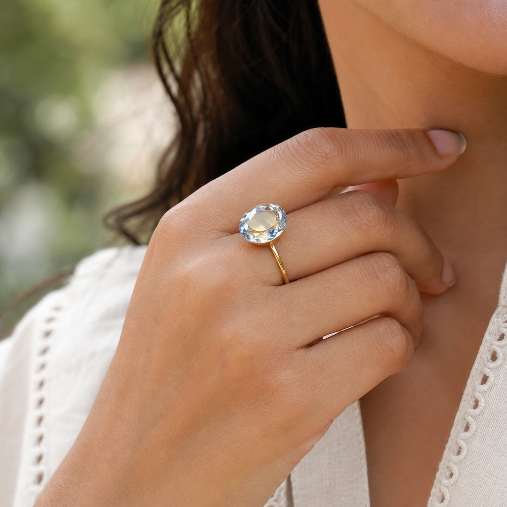 Peetambari Neelam woman wearing gemstone ring