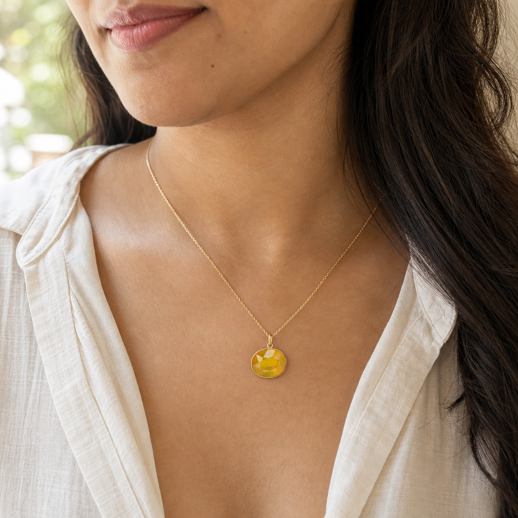 Pukhraj woman wearing gemstone pendant