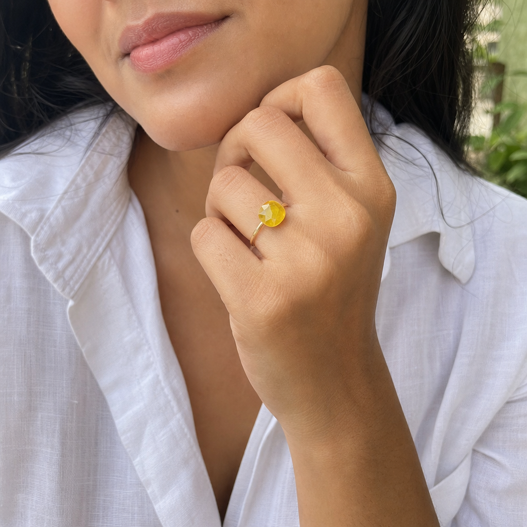 Pukhraj woman wearing gemstone ring