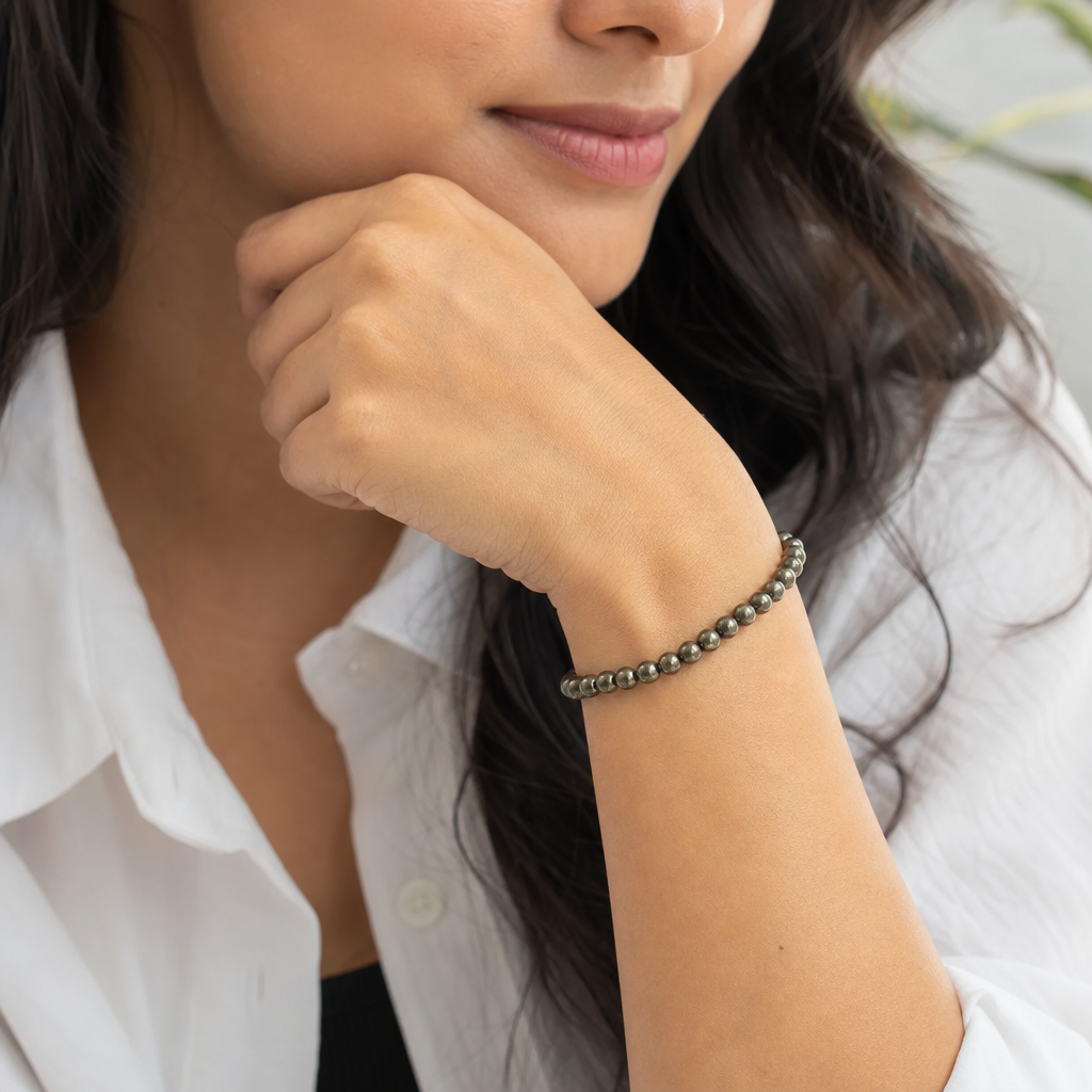 Woman wearing Raw Pyrite Bracelet (Women - 6mm Beads)