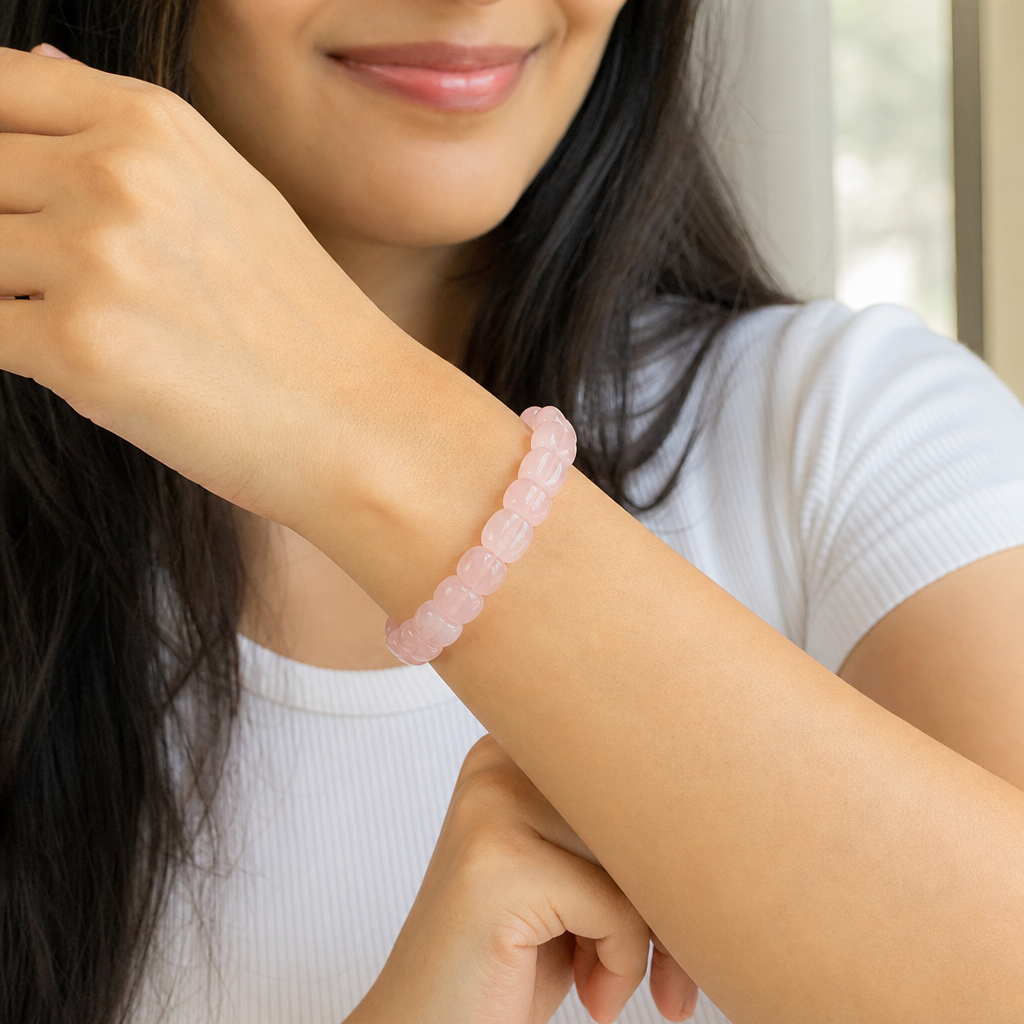 Woman wearing Rose Quartz Flat-Beaded Bracelet