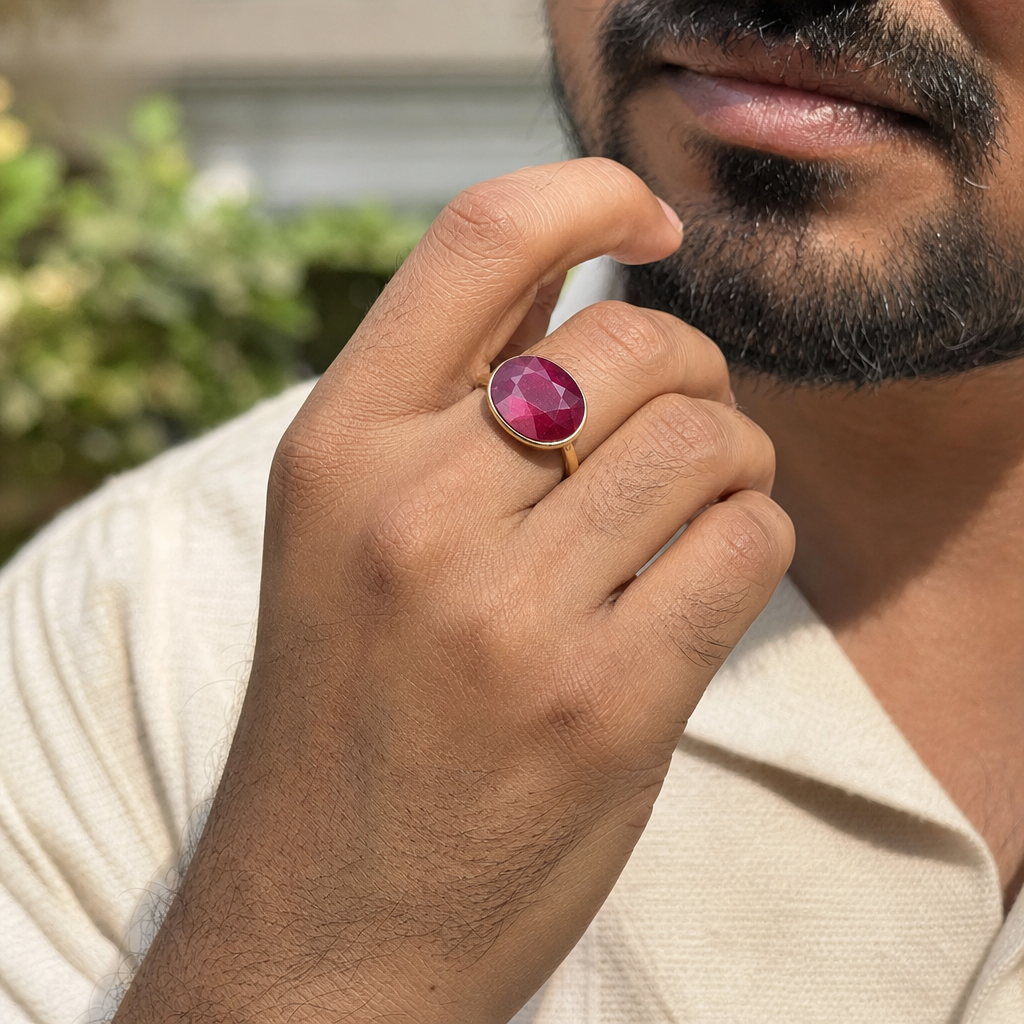 Ruby man wearing gemstone ring