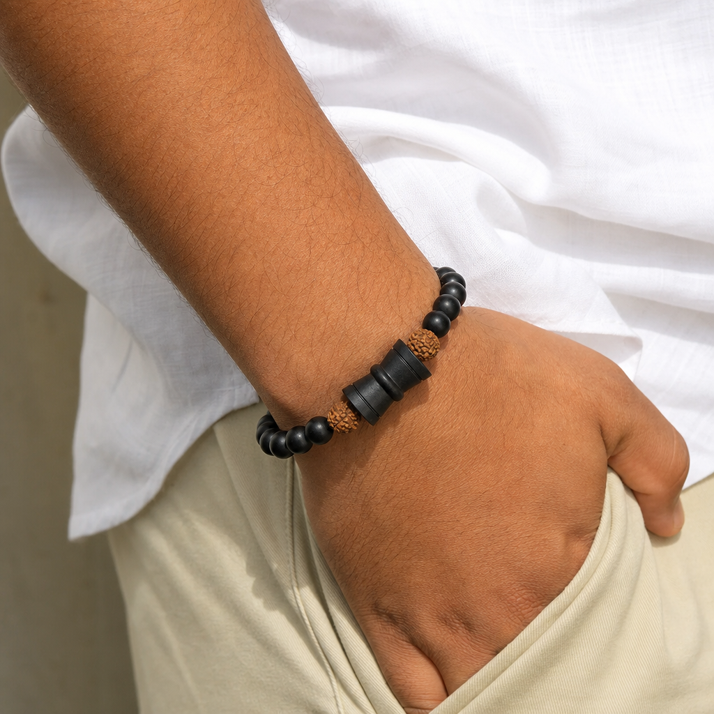 Man wearing Rudraksha Karungali Healing Bracelet With Damru 8mm