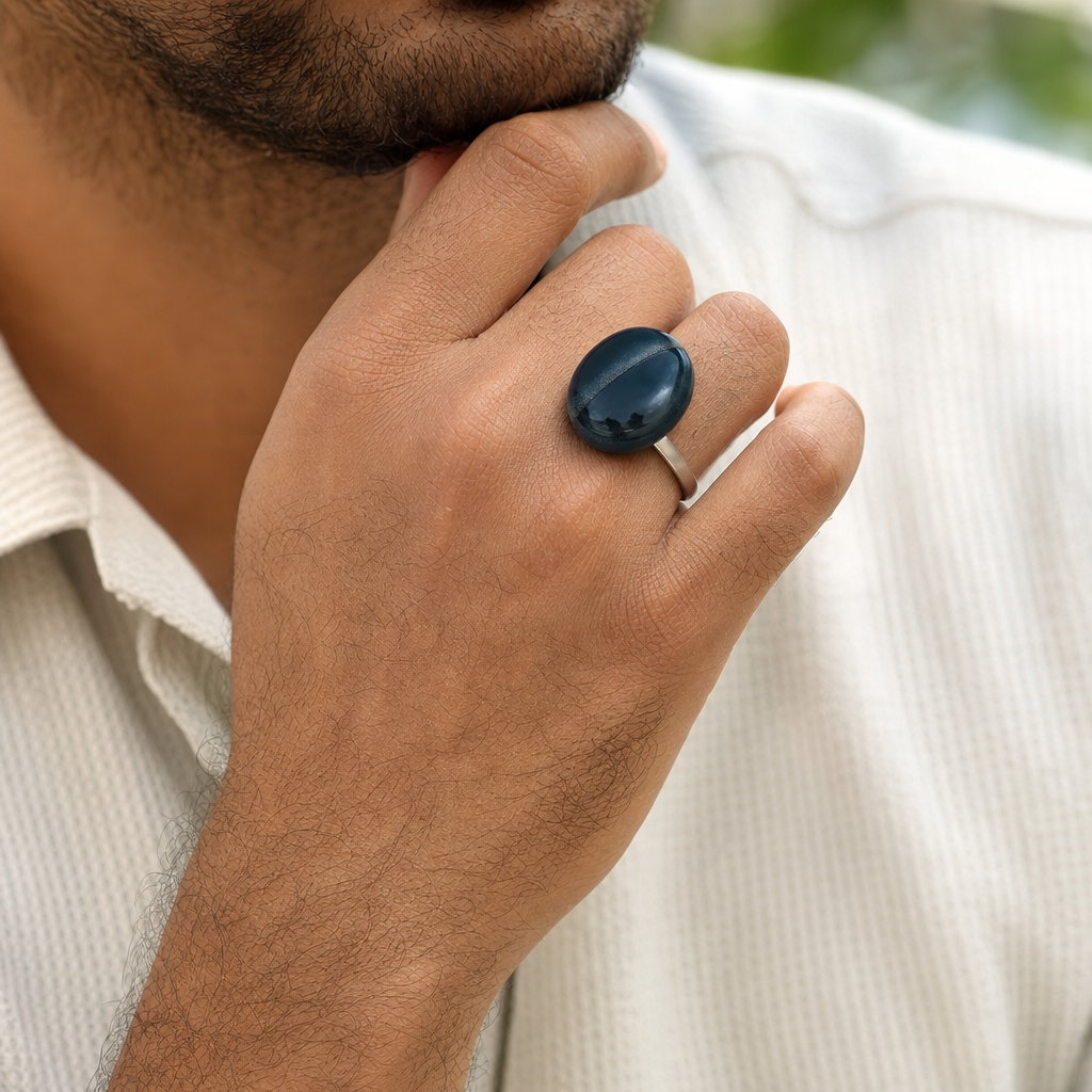 Sulemani Hakik man wearing gemstone ring