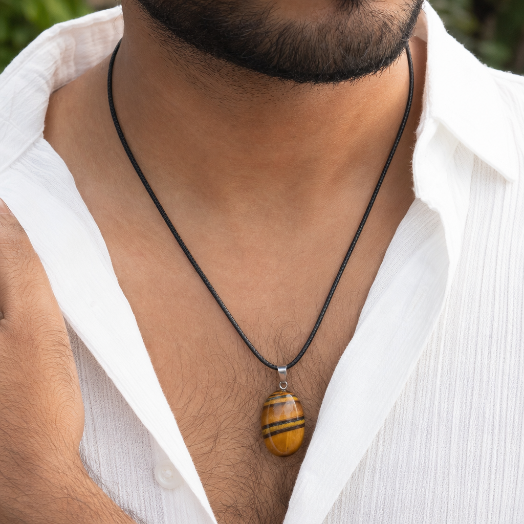Tiger Eye man wearing gemstone pendant