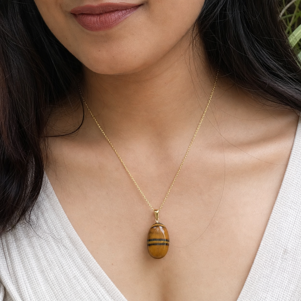Tiger Eye woman wearing gemstone pendant