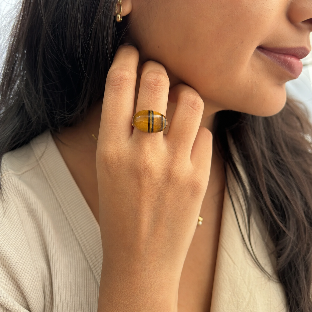 Tiger Eye woman wearing gemstone ring