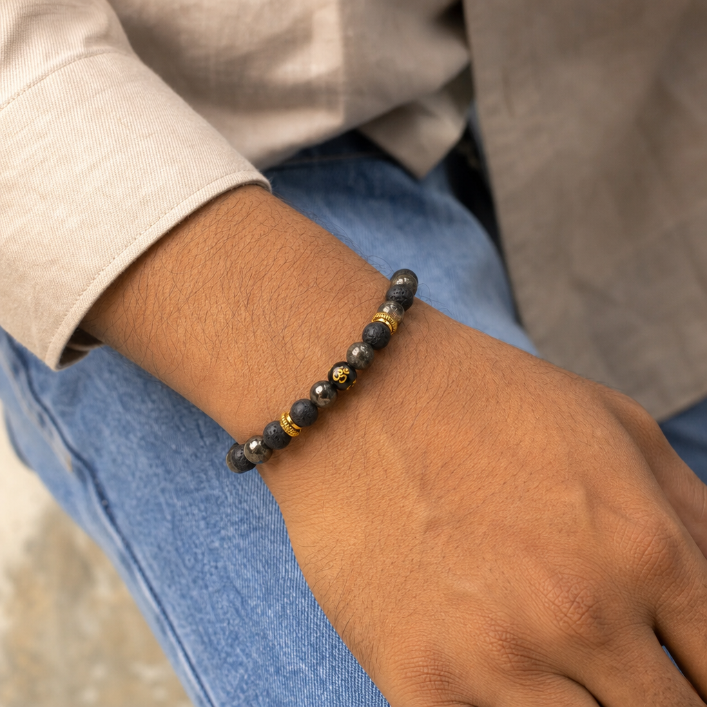 Man wearing Wealth OM Pyrite Bracelet