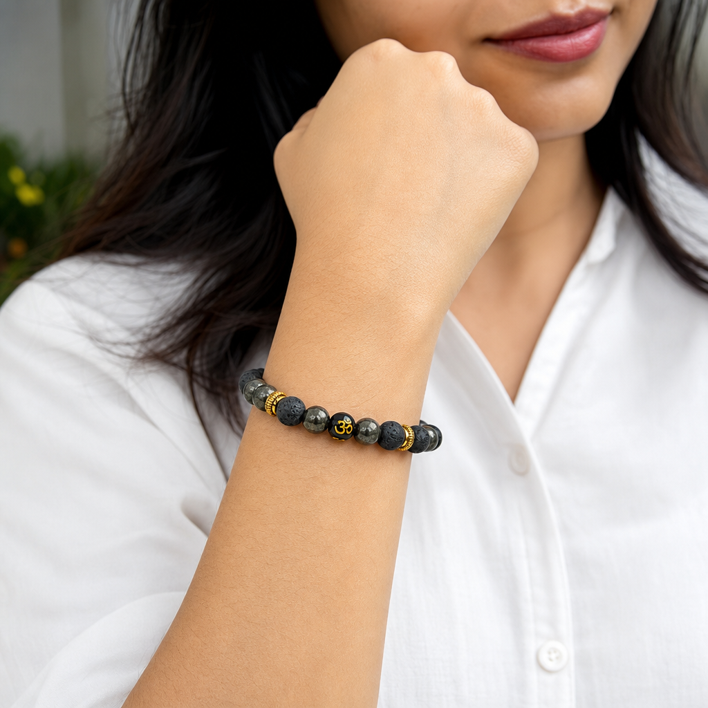 Woman wearing Wealth OM Pyrite Bracelet