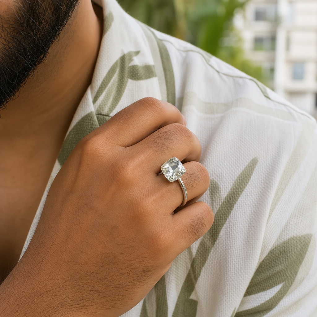 White Pukhraj man wearing gemstone ring