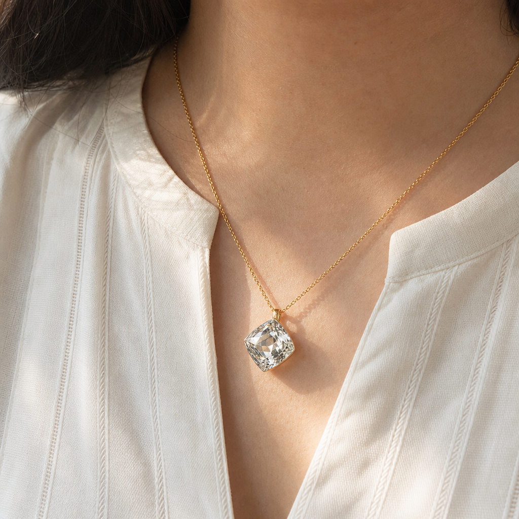 White Pukhraj woman wearing gemstone pendant