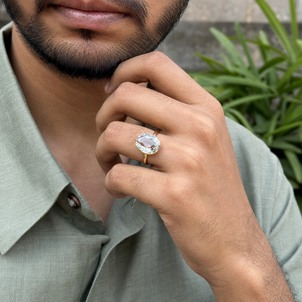 White Topaz man wearing gemstone ring