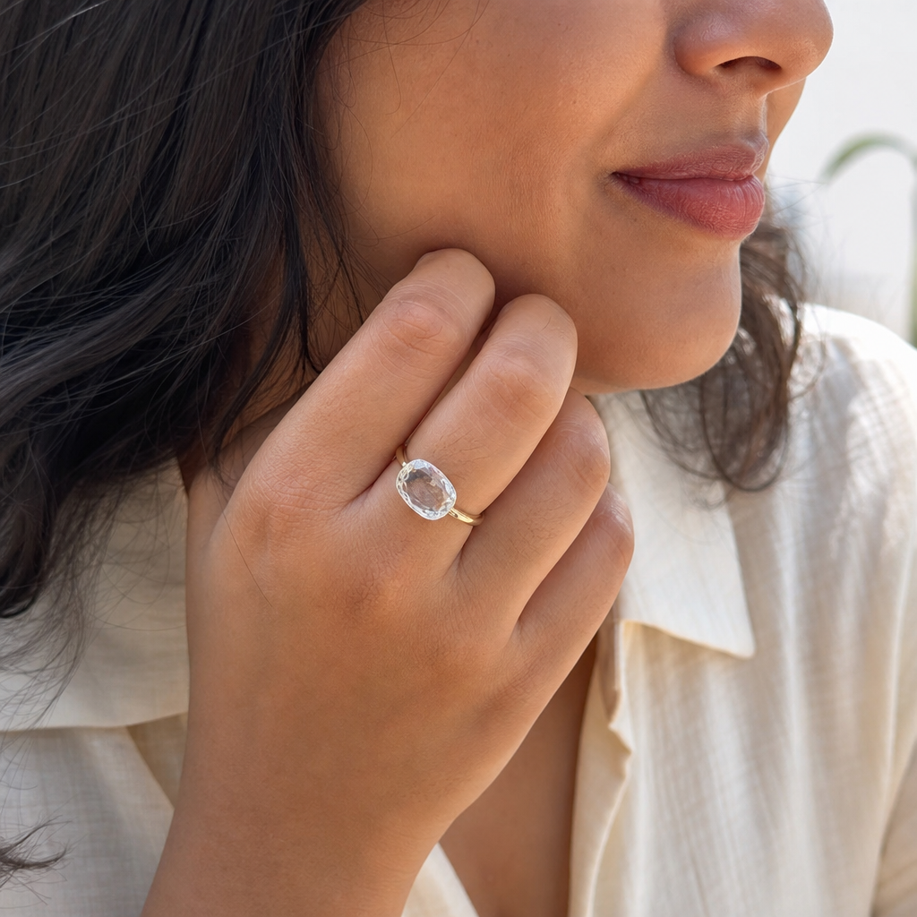 White Topaz woman wearing gemstone ring