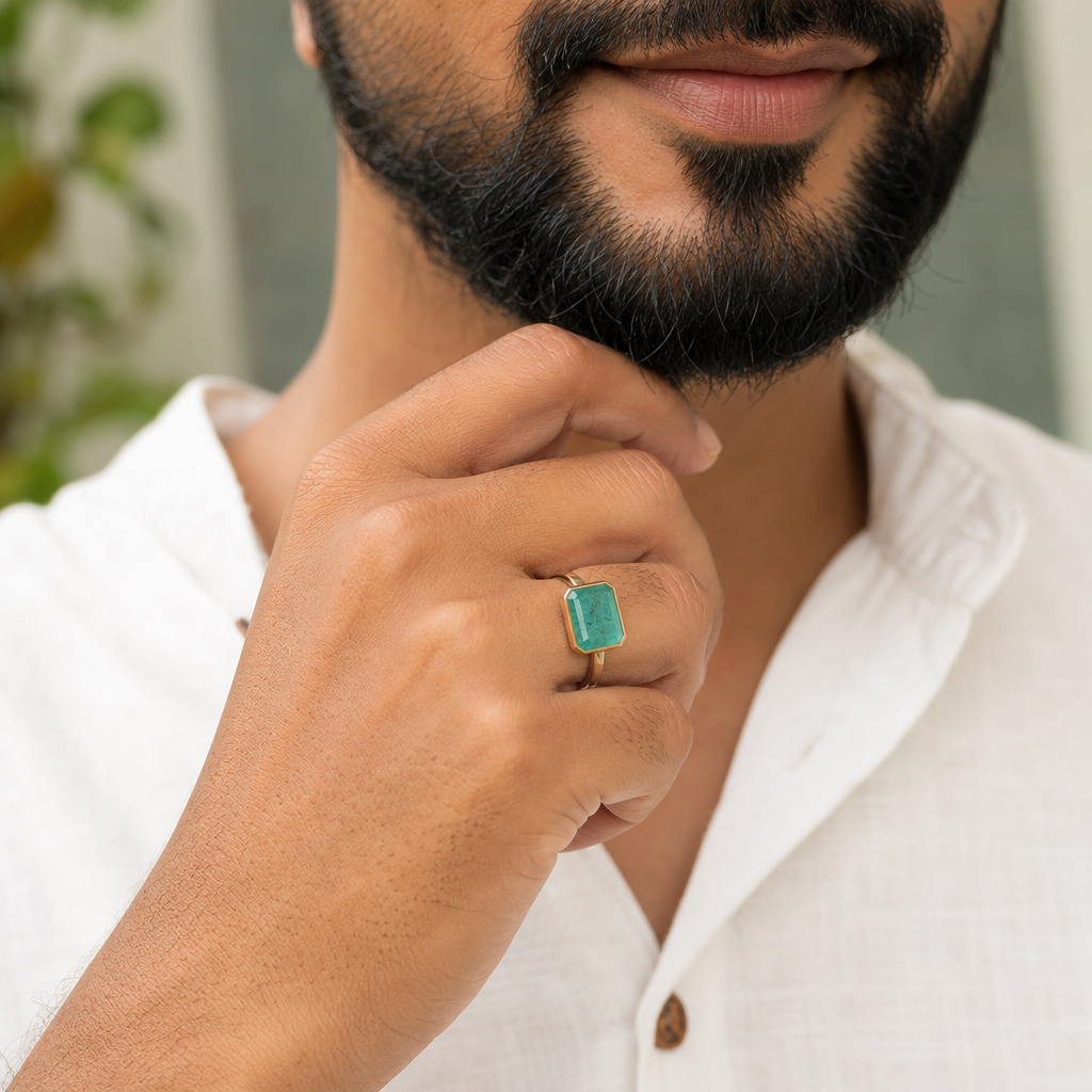 Zambian Emerald man wearing gemstone ring