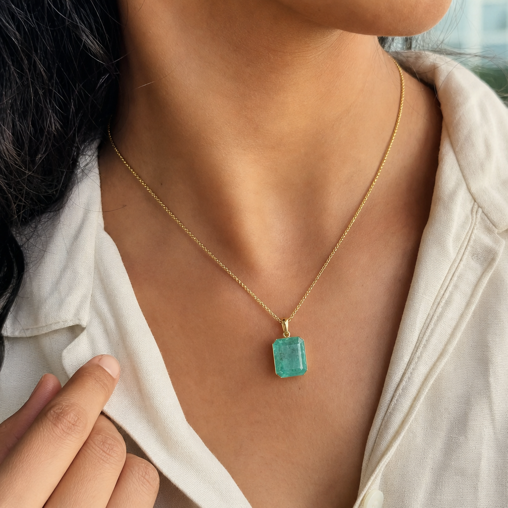 Zambian Emerald woman wearing gemstone pendant