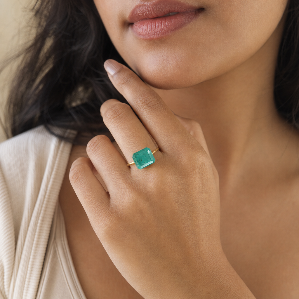Zambian Emerald woman wearing gemstone ring